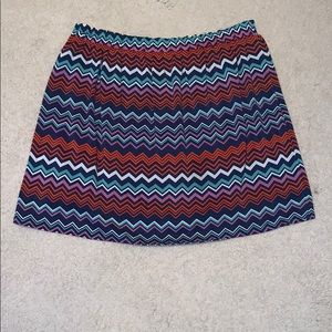 Navy skirt with red and white chevron pattern